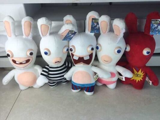 Reizender irreredender Rabbids Karikatur-Plüsch Rayman spielt weiße nette Gewohnheit