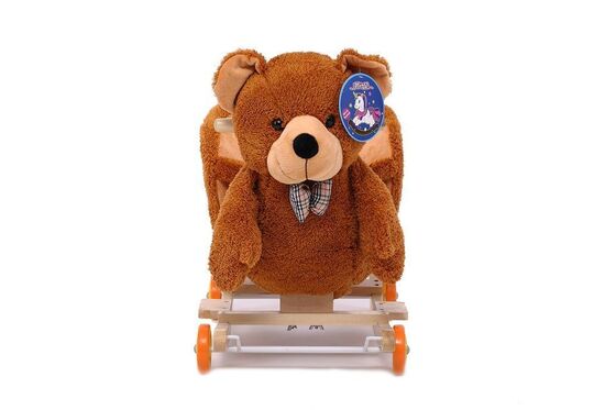 Reizendes nettes Baby spielt Teddybär-Plüsch-Baby-Schwingtierstuhl