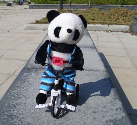 100% pp. Baumwollmusikalische Plüsch-Spielwaren, elektronischer Fahrrad-Tierpanda-weiches Spielzeug